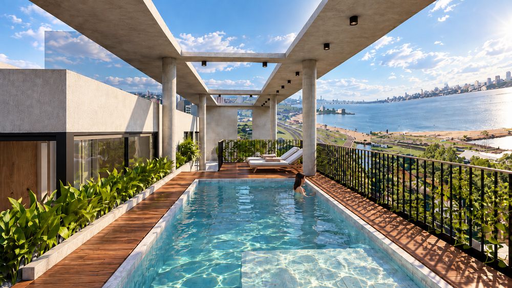 Piscina de la azotea con deck de madera y vista a la ciudad y al río Paraná